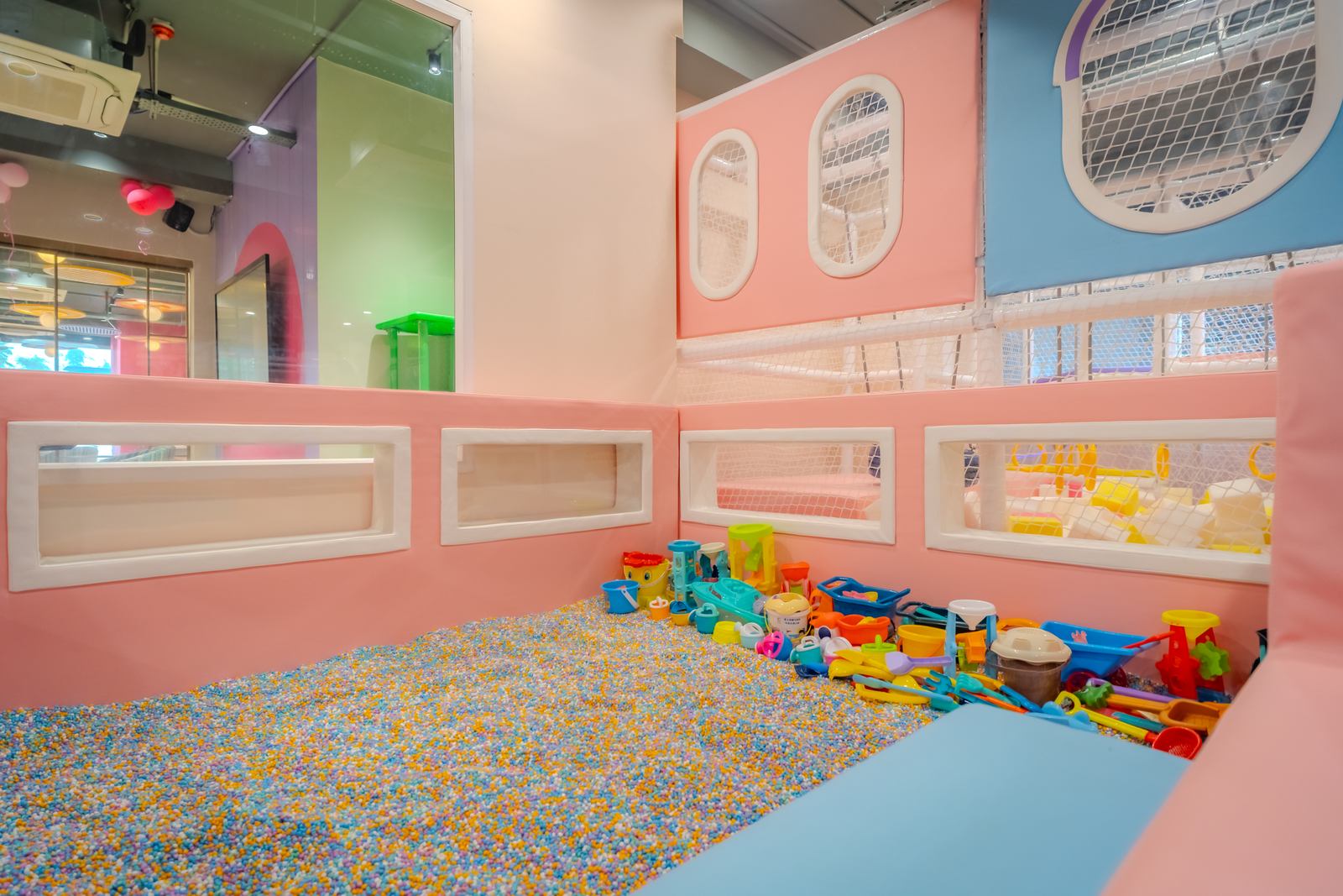 Sensory foam bead pit with buckets and spades